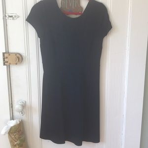 Loft navy blue dress with open back and bow.